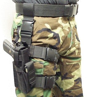 a man wearing tactical drop leg holster