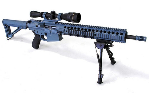 black AR bipod mounted on a long gun