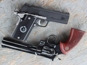 a picture of a coonan and a colt python