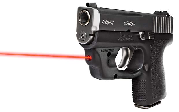 a picture of a kahr pm9 with a lasermax centerfire attached