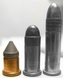 a picture of the BB Cap next to a .22 Short and a .22 Long
