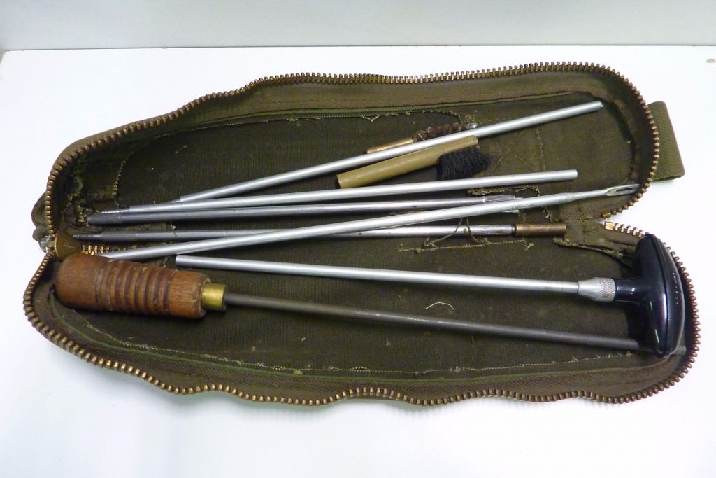 image of wood and steel gun cleaning rods with brushes in 2017