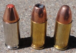 Three 9mm cartridges with different bullet types