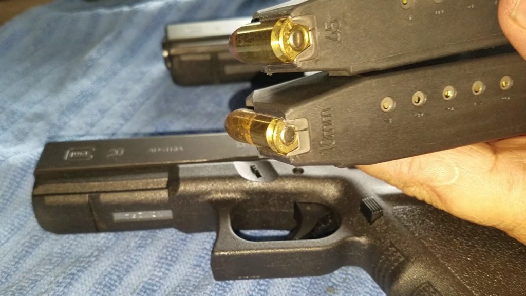 a picture of a Glock 20 and a Glock 21
