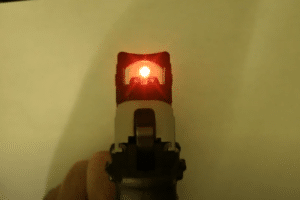 A picture of an RMR red dot sight co-witnessing