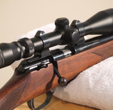This is a 22 caliber rifle that has a conversional bolt action and equipped with an optional scope