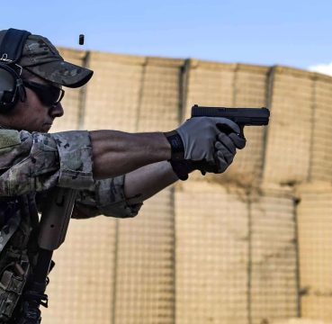 A picture of a man shooting a Glock 17 Gen 5