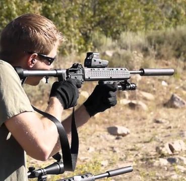image of a man using Kel-Tec Sub-2000 in shooting