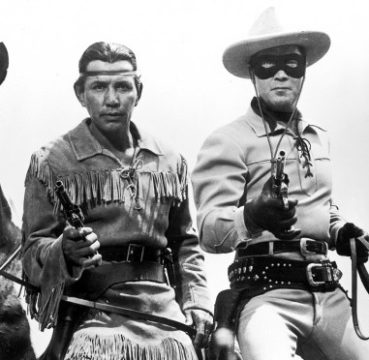 image of Lone Ranger and Tonto holding their revolvers