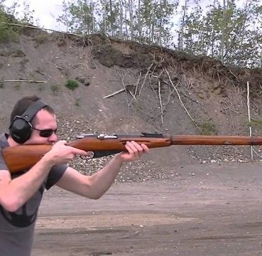 image of a man aiming his Mosin Nagant M91-30
