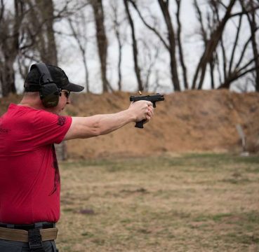 A man in a shooting competition