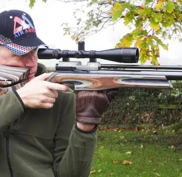 man shooting air rifle