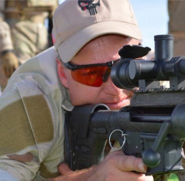 image of a man wearing shooting glasses for eye protection